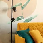Yellow In With Air Conditioning And Desk For Remote Work By Renters *